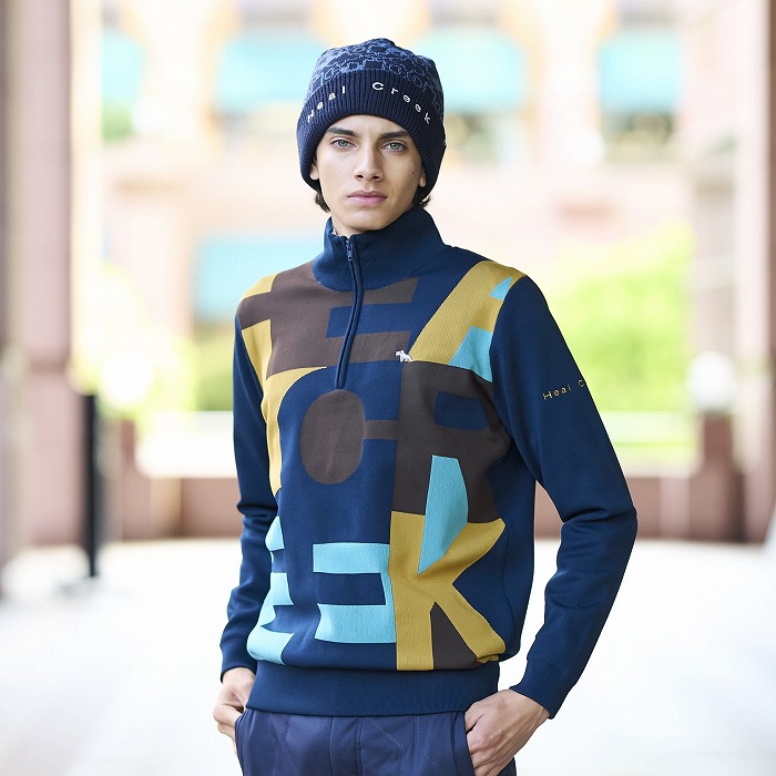 Heal Creek（ヒールクリーク）防風裏地付 ロゴ柄軽量ハーフジップセーター